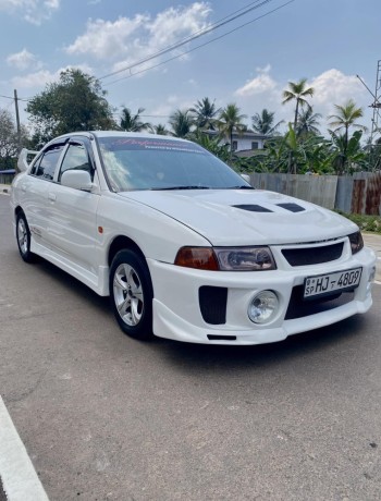 mitsubishi-lancer-ck1-hj-big-9